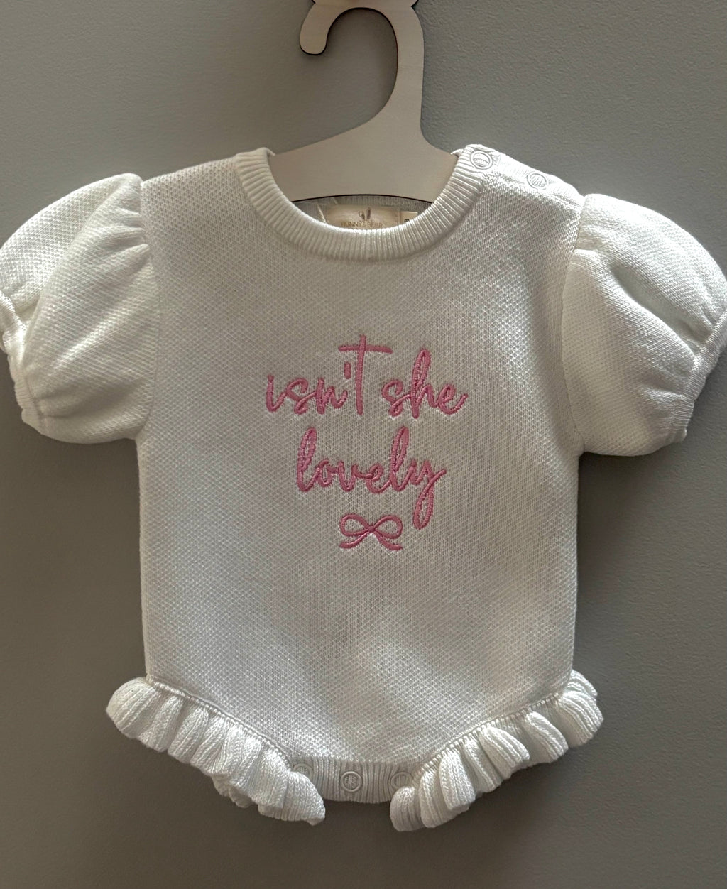 short sleeve baby romper with frill detail